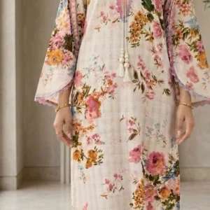 Cream designer Pakistani floral kaftan dress in imported fabric with embroidered lace neckline and tassel details.