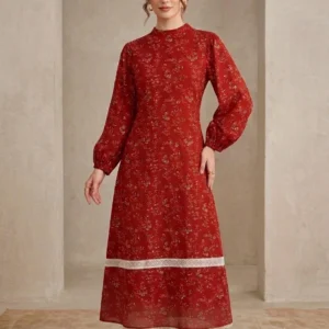 Vintage style floral high neck dress with balloon sleeves in rust red bubble crepe fabric featuring lace trim details.